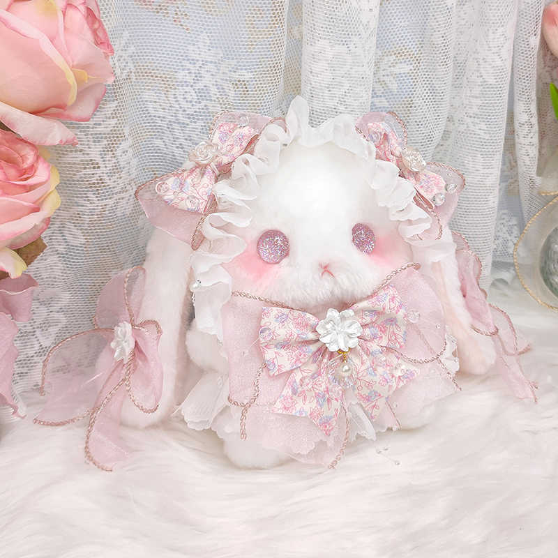 Lolita lop-eared rabbit doll bag, original bowknot, cute plush bag, pearl handicraft.