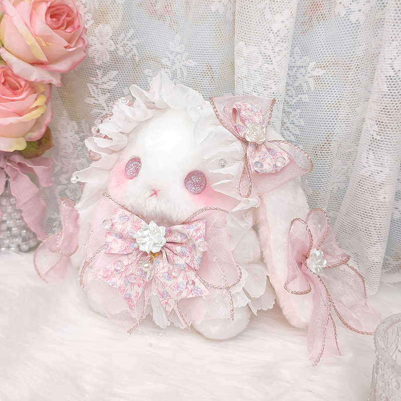 Lolita lop-eared rabbit doll bag, original bowknot, cute plush bag, pearl handicraft.